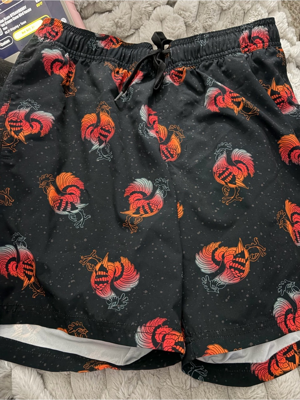 Black Swim Trunks with Red-Orange Rooster Print